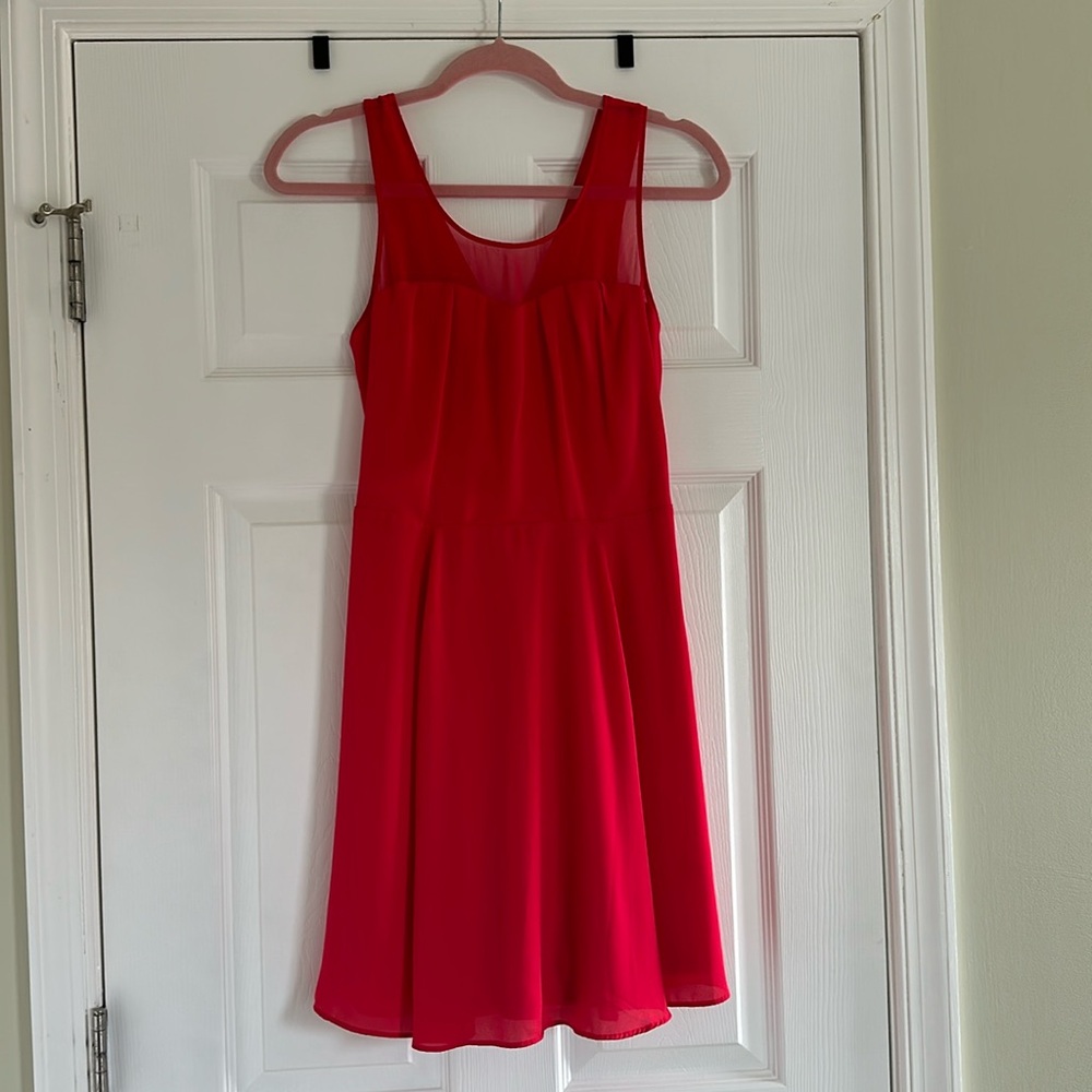 Red Express dress. Cute and flowy, crossed in the back